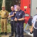 Zdjęcie przedstawicieli Komendy Powiatowej PSP w Wolsztynie, Komendy Powiatowej Policji w Wolsztynie oraz Zarządu Oddziału Gminnego ZOSP RP w Przemęcie.