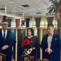 Na fotografii widać wójta, zastępcę wójta i panią skarbnik, która trzyma kwiat.